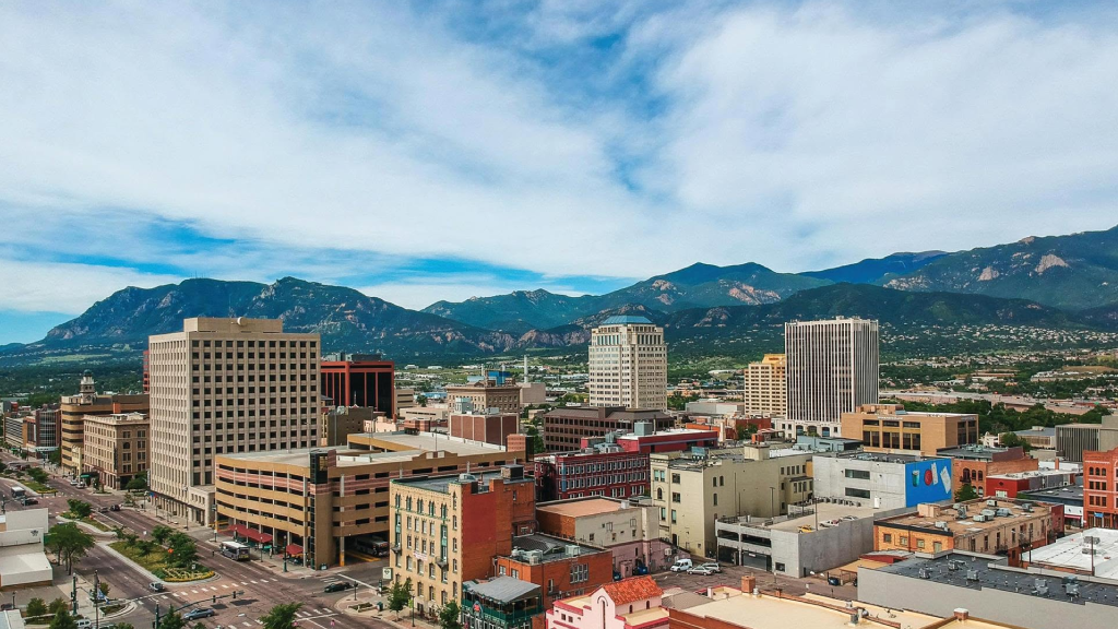 Private limousine traveling from Denver Airport toward Colorado Springs